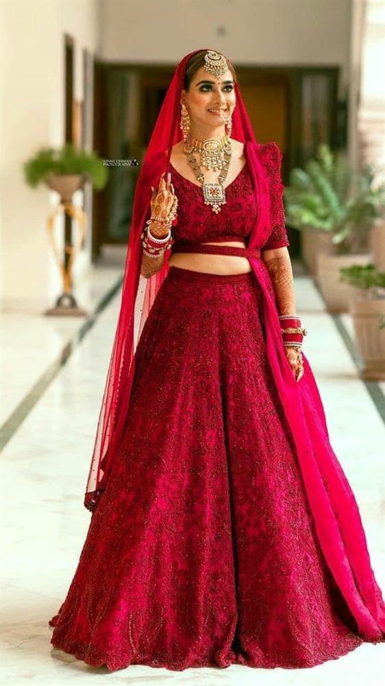 image of a lehenga in red color